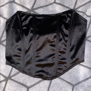 Black strapless corset top.